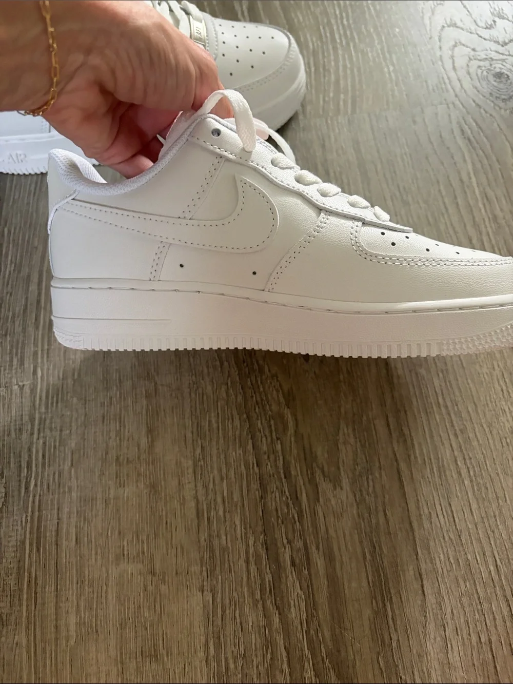 Air Force 1’s Men’s White Low-Top Sneakers